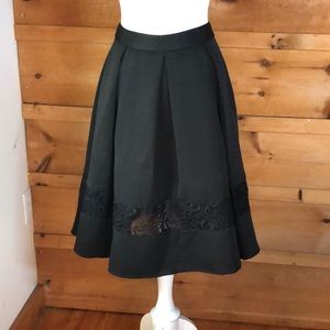 Mid-waist to just above knee - skirt
